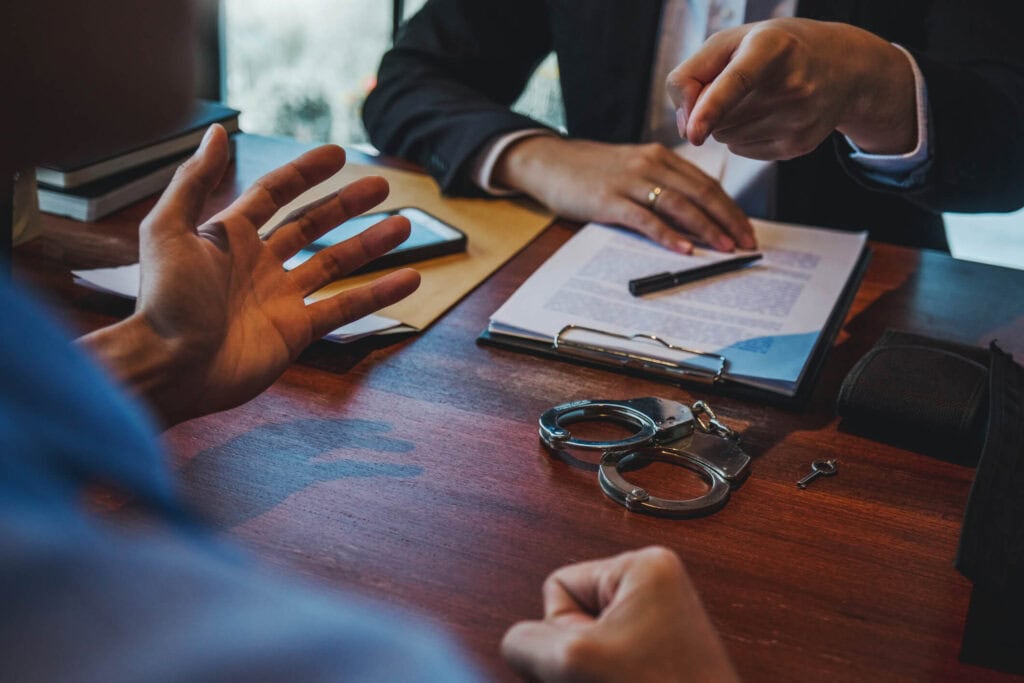 A person meets with an attorney at Lipp Law LLC in Las Vegas NV to discuss options after deciding to confess